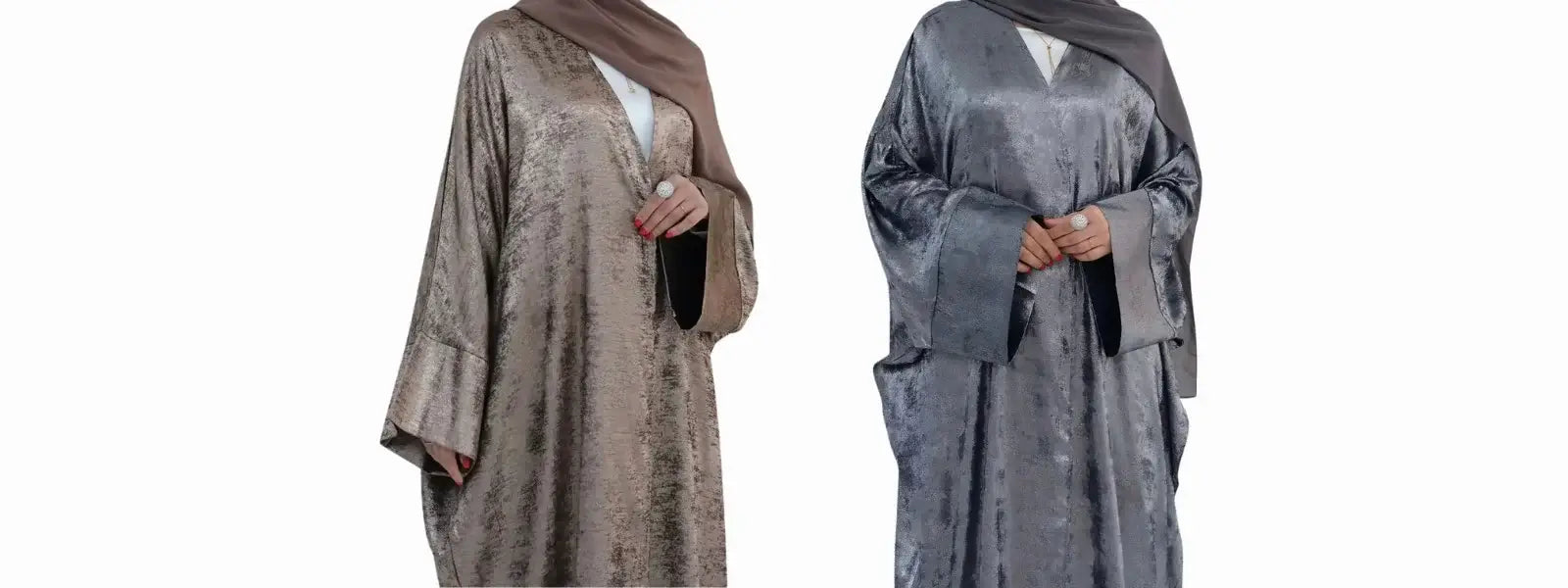 Two women wearing long, crushed velvet abayas on a white background